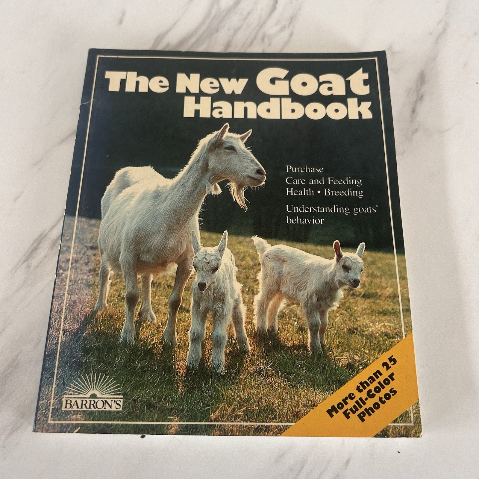 The New Goat Handbook: Housing Care Feeding Sickness Breeding Softcover 1989