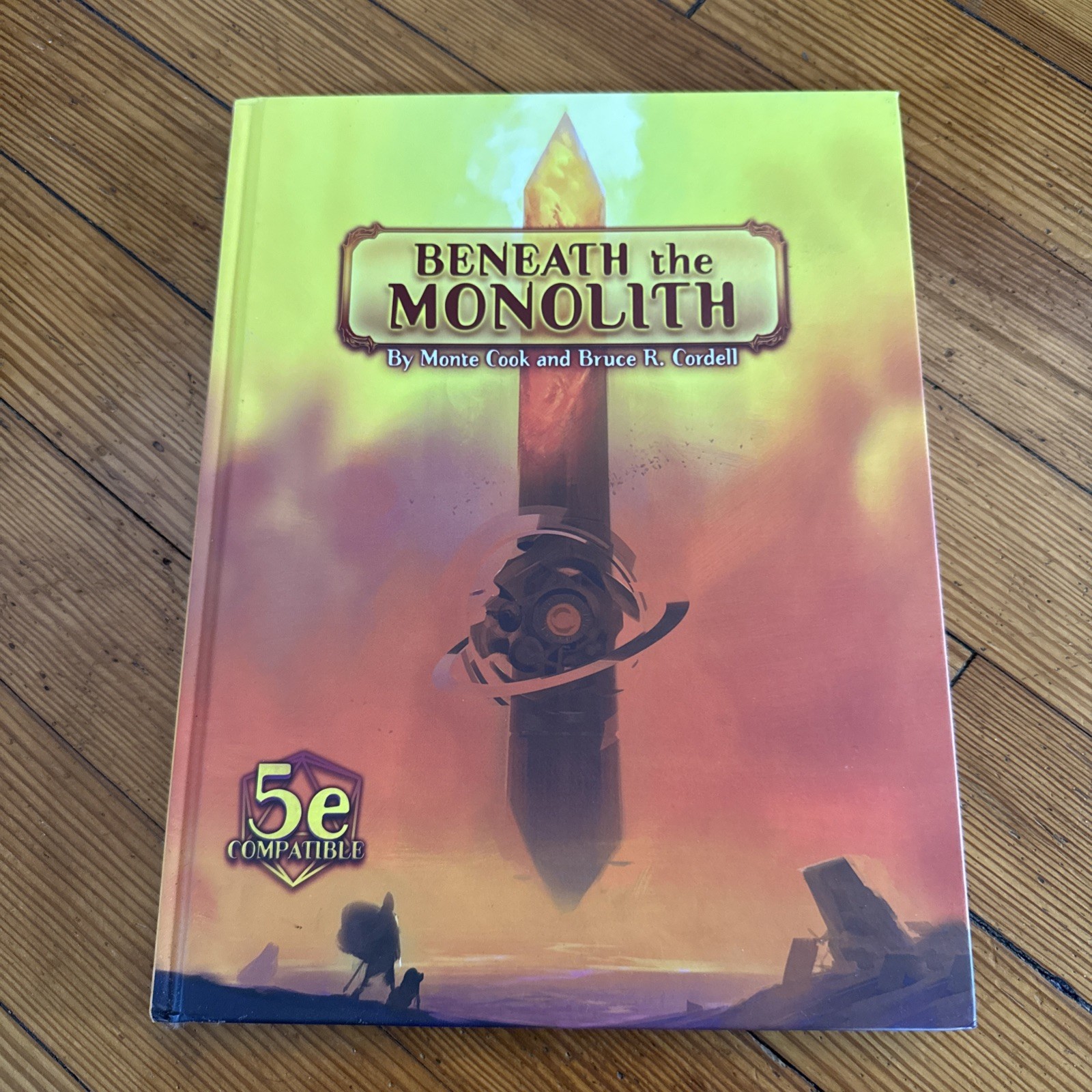 Beneath the Monolith Ninth World Setting by Monte Cook Games, Hardcover