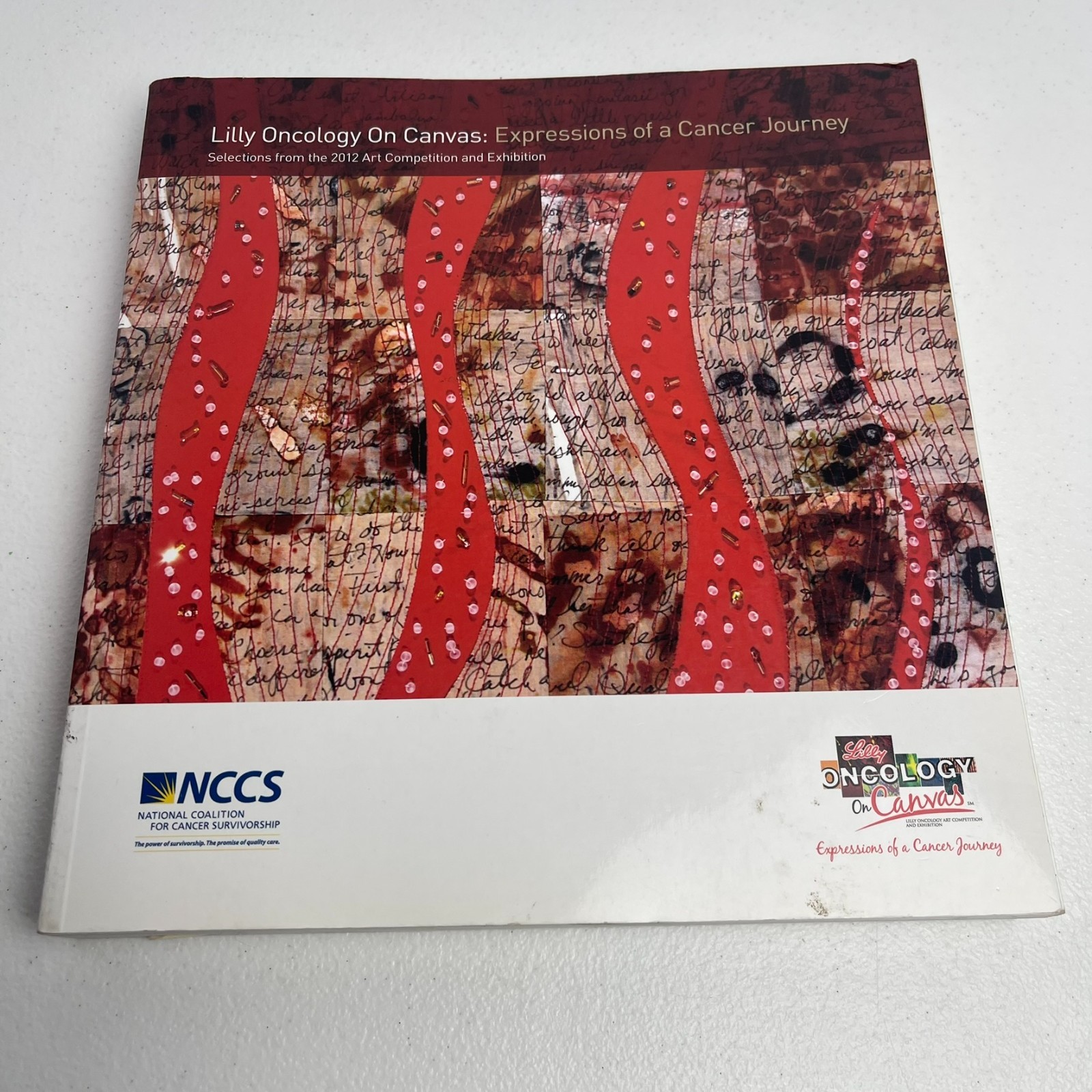 Lilly Oncology on Canvas – 2012 Art NCCS pb book