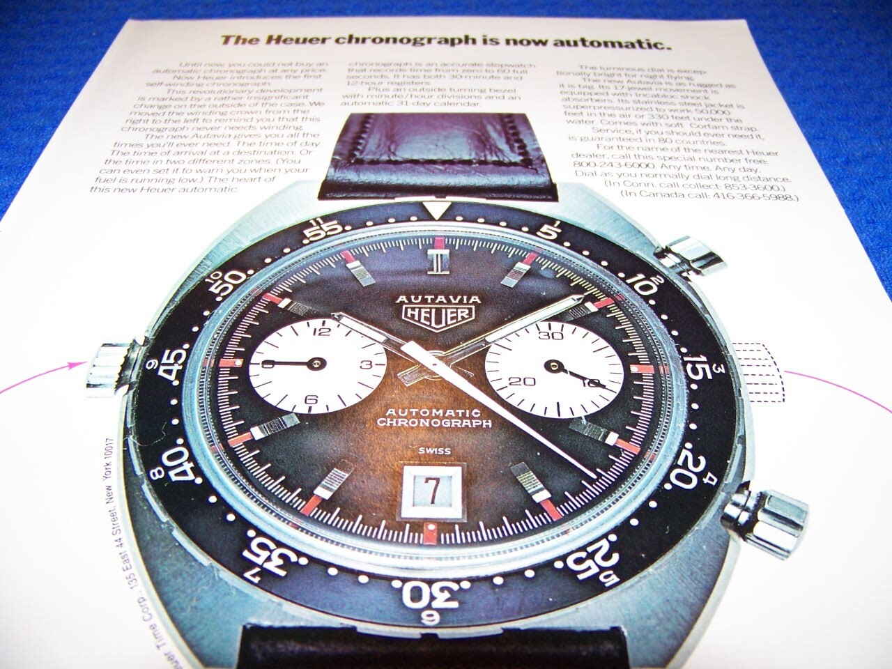 1969 HEUER CHRONOGRAPH “IS NOW AUTOMATIC..”.. 1-PAGE SALES AD (689MM)
